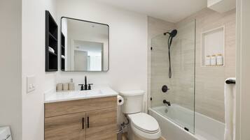 Hair dryer, towels, soap, shampoo