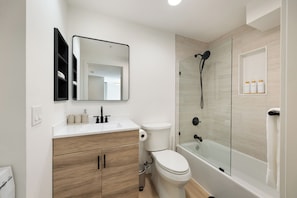 Hair dryer, towels, soap, shampoo