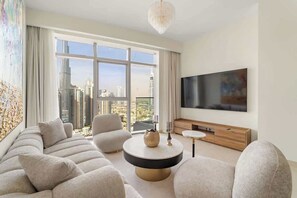 TV - Luxury 1-Bed with Burj Khalifa Views in Downtown (Dubai)