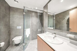 Shower, hair dryer, shampoo - Modern 1BR in Brand-New Cloud Tower in JVT (Dubai)