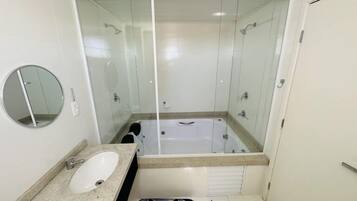 Shower, towels, soap, toilet paper