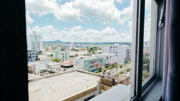 Quarto solteiro luxo, vista para a cidade | Roupas de cama antialérgicas, Wi-Fi de cortesia, roupa de cama