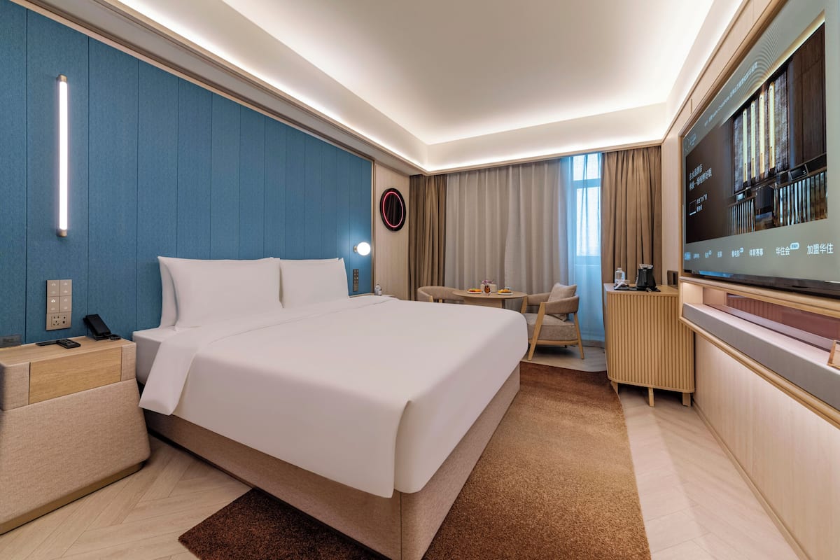 Basic Single Room, City View | Peralatan tempat tidur premium, gebar bulu kapas, bar mini percuma 