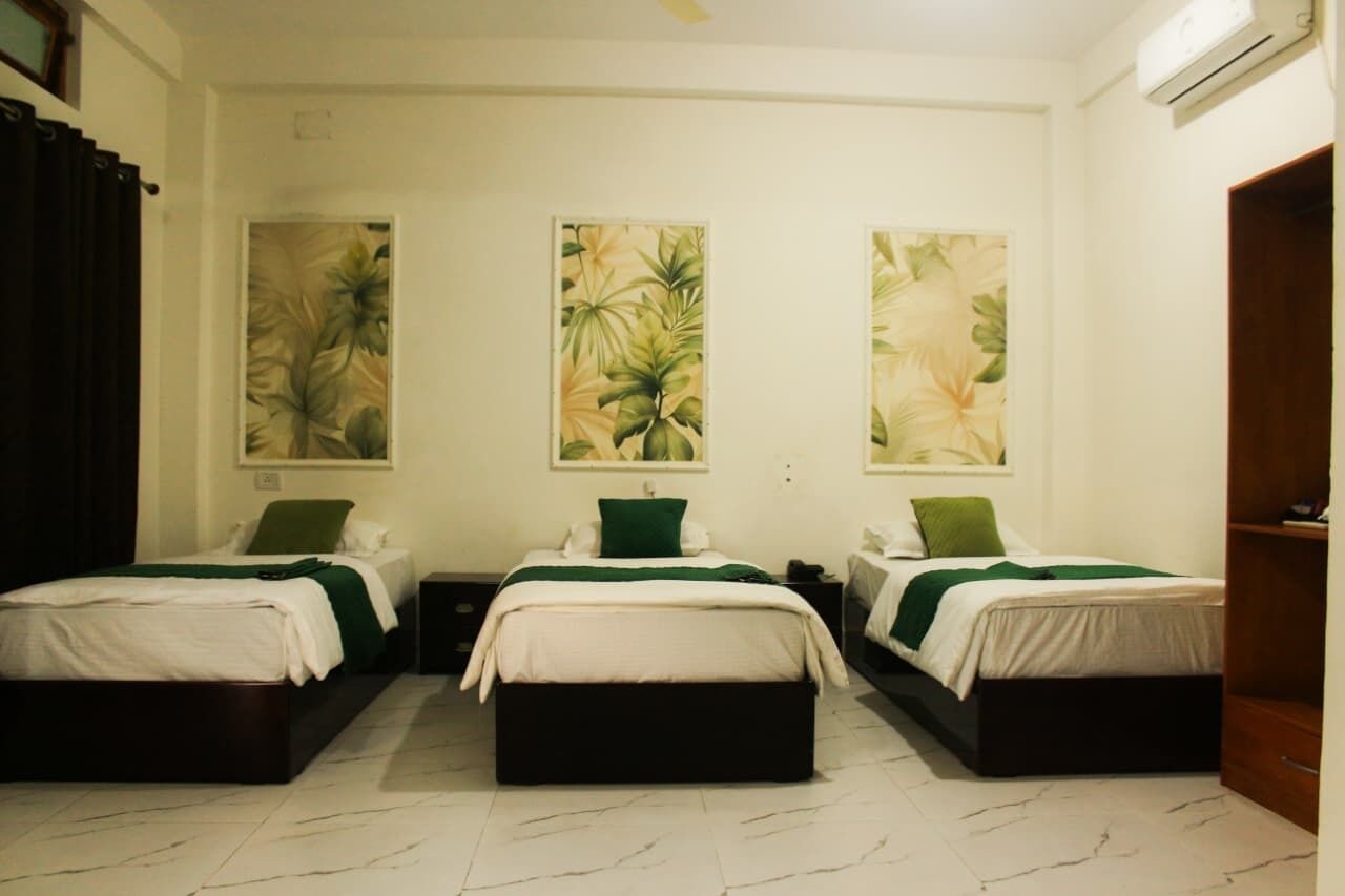 Habitación superior | Escritorio, wifi gratis y ropa de cama 