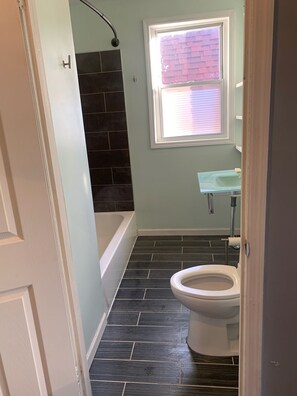 Bathroom - Industrial Loft 2BR w/ Exposed Brick + 2 Private Decks with Backyard (Chicago)