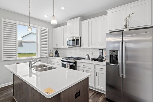 A comfortable 3-bedroom home offers 5 beds and can accommodate up to 8 guests.
