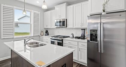A comfortable 3-bedroom home offers 5 beds and can accommodate up to 8 guests.