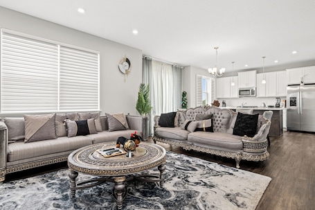Living area. A comfortable 3-bedroom home offers 5 beds and can accommodate up to 8 guests.