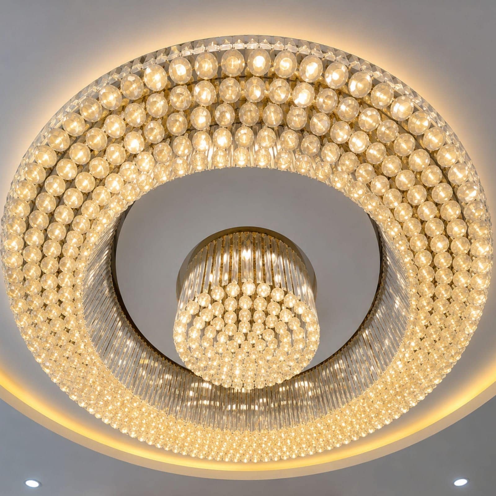 A chandelier with a circular design and multiple tiers of lights.
