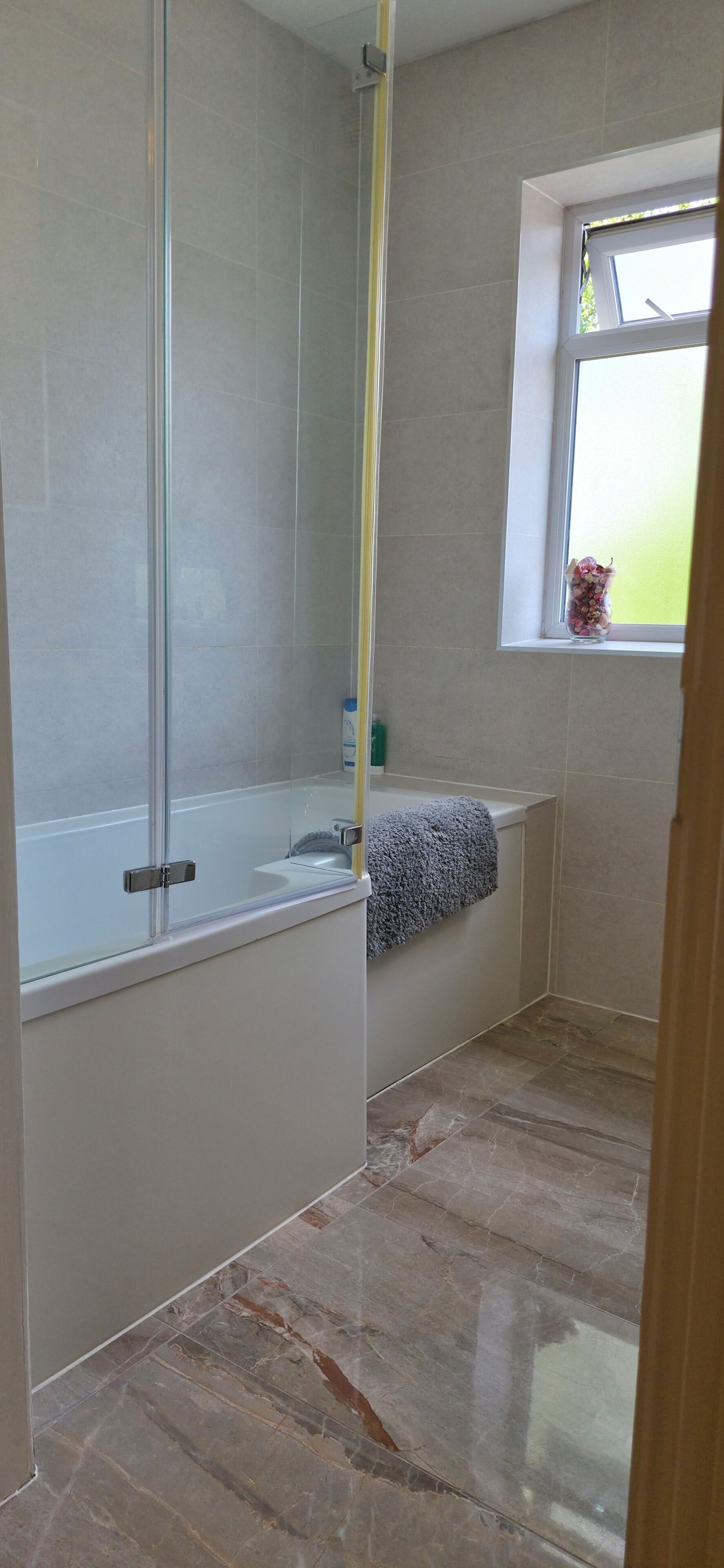 Shower, towels, soap, toilet paper