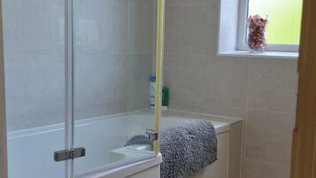 Shower, towels, soap, toilet paper