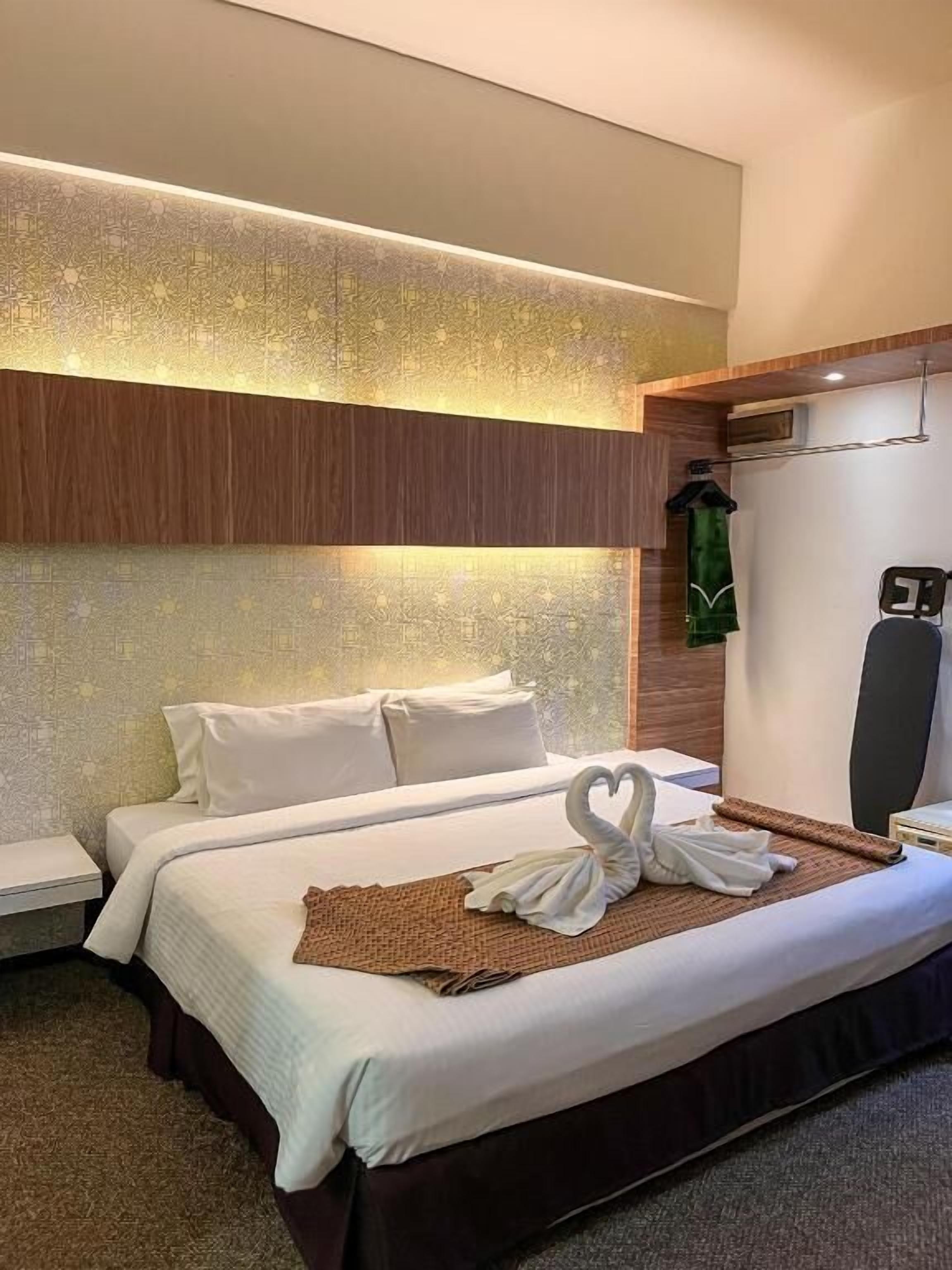 Suite ejecutiva, vista a la ciudad | Tabla de planchar con plancha y wifi gratis 