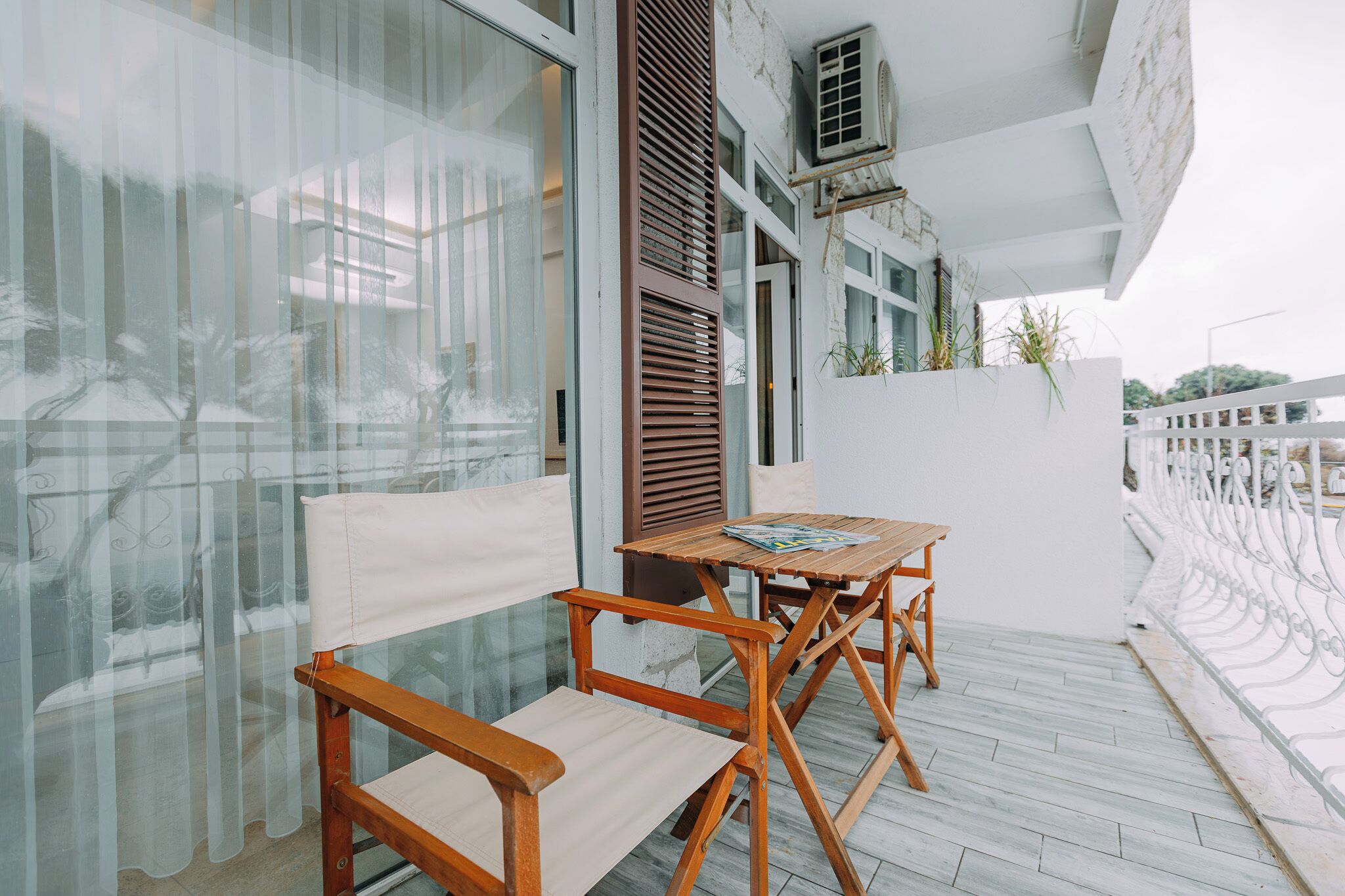 Suite Deluxe, vista al mar | Restaurante al aire libre
