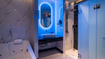 One Bedroom Suite with Jacuzzi | Bathroom | Separate tub and shower, hair dryer, towels, soap