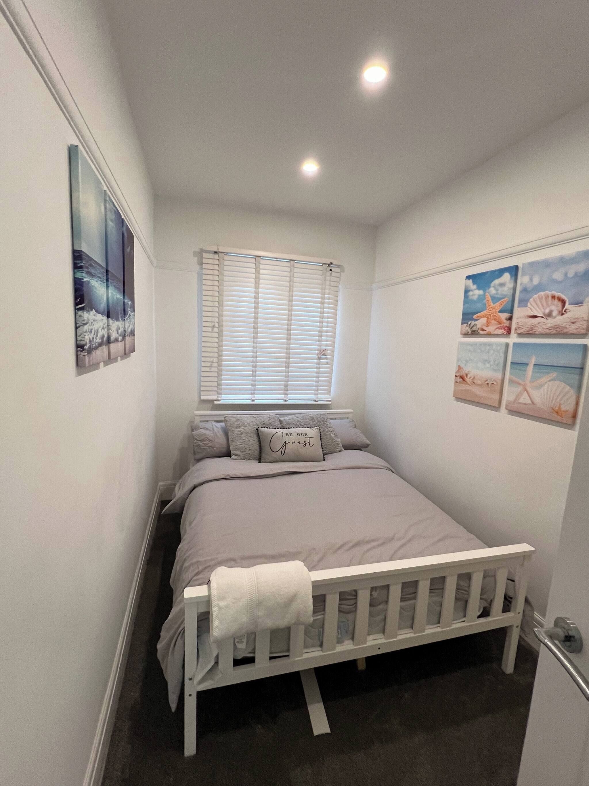 2 habitaciones, tabla de planchar con plancha y internet 