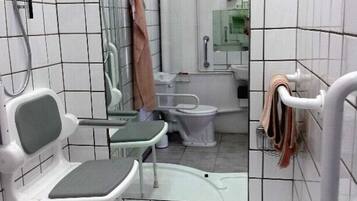 Shower, towels, soap, toilet paper
