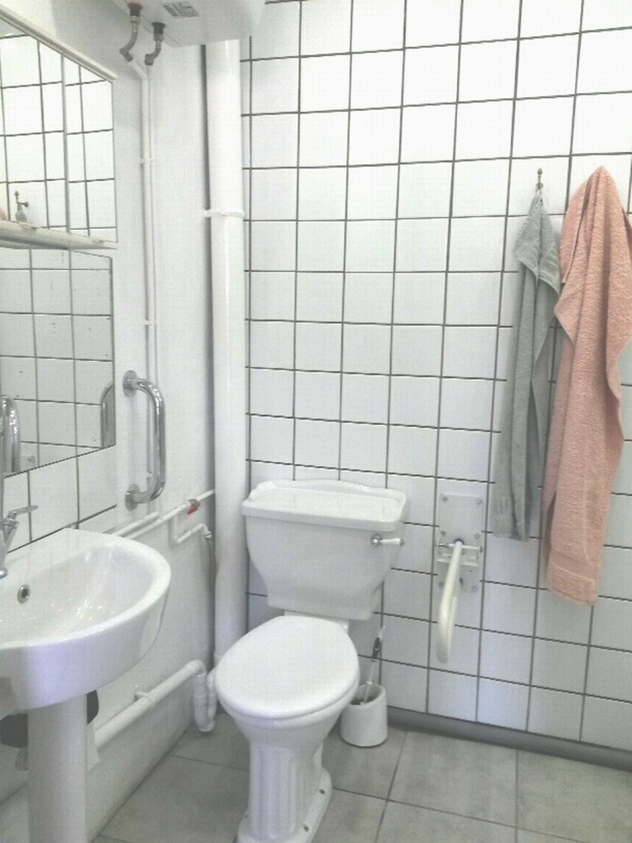 Shower, towels, soap, toilet paper