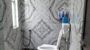 Shower, towels, soap, shampoo