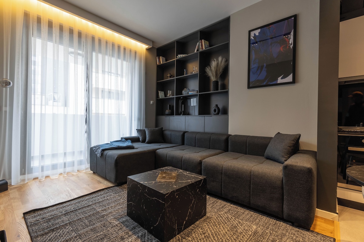 Luxury Apartment, City View | Living area | 50-inch Smart TV with digital channels