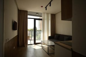 Suite, Balcony, Sea View | Living area | Flat-screen TV - Thom Tower (Batumi)