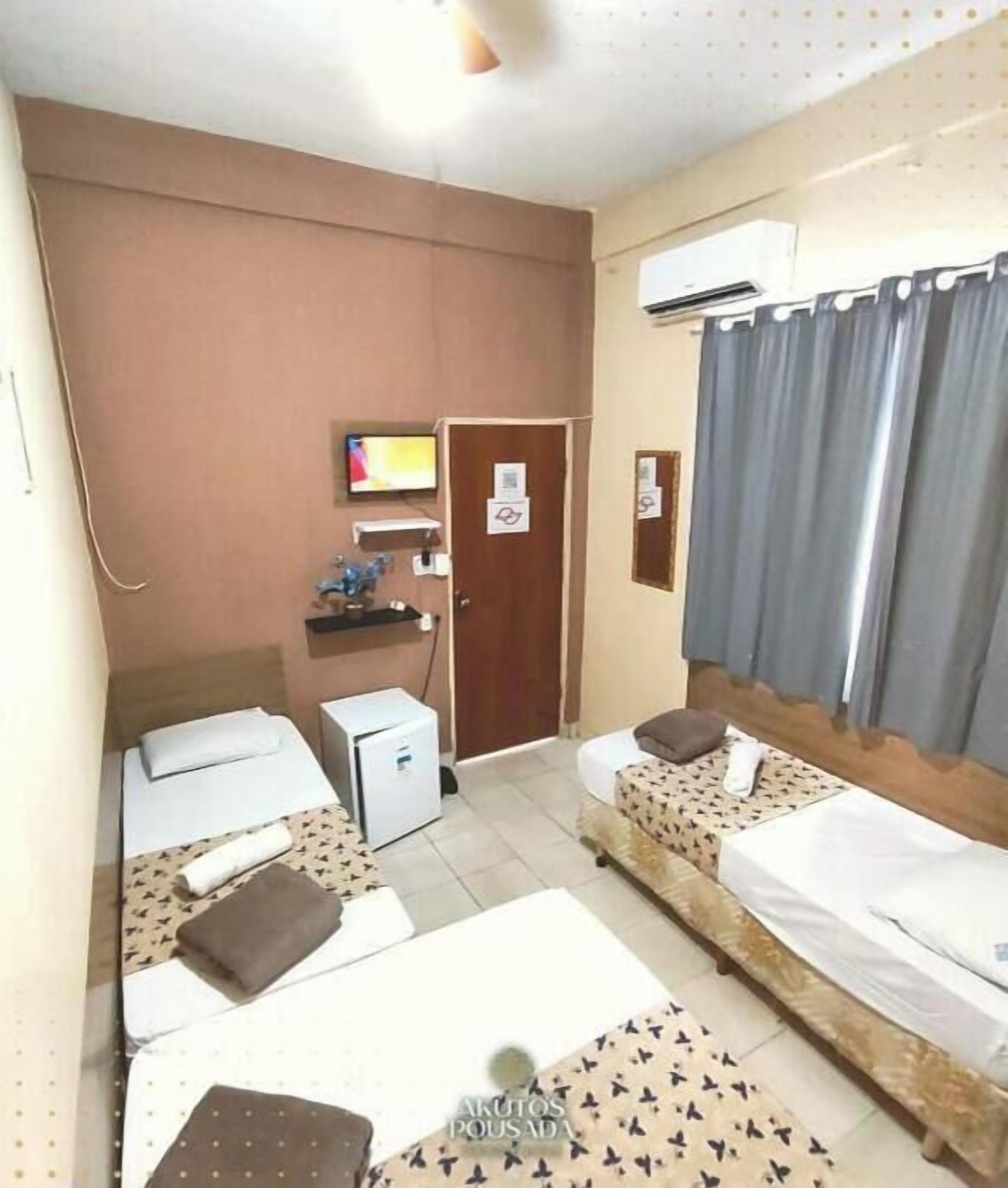 Kamar Quadruple Ekonomi | Minibar dan Wi-Fi gratis