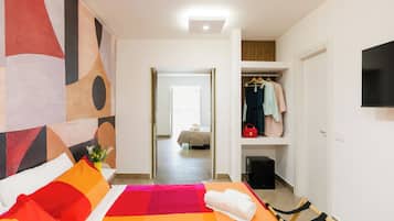 Deluxe Quadruple Room, Balcony, Hill View | Laptop workspace, iron/ironing board, free WiFi