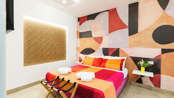 Deluxe Quadruple Room, Balcony, Hill View | Laptop workspace, iron/ironing board, free WiFi