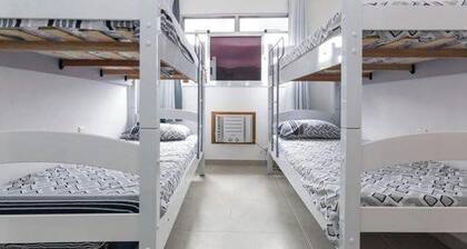 Shared room in the South Zone (Rocinha)