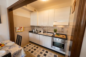 Appartement Familial, 1 chambre, balcon (Appartamento Magenta) | Cuisine privée
