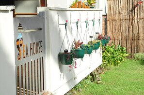 Apartment, 2 Bedrooms, Smoking, Patio | Property grounds - Charming 2-bedroom Apartment in Gqeberha With Garden Views (Gqeberha)