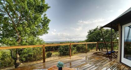 Romantic Hilltop Safari Glamping Tent with Lake Views near Lake Travis in Marble Falls, Texas
