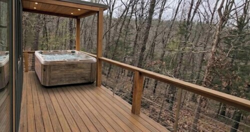 Peaceful Wooded Getaway with Hot Tub, Fire Pit & Scenic Views in Pittsburg, Missouri