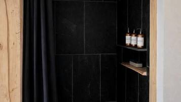 Hair dryer, towels, soap, shampoo
