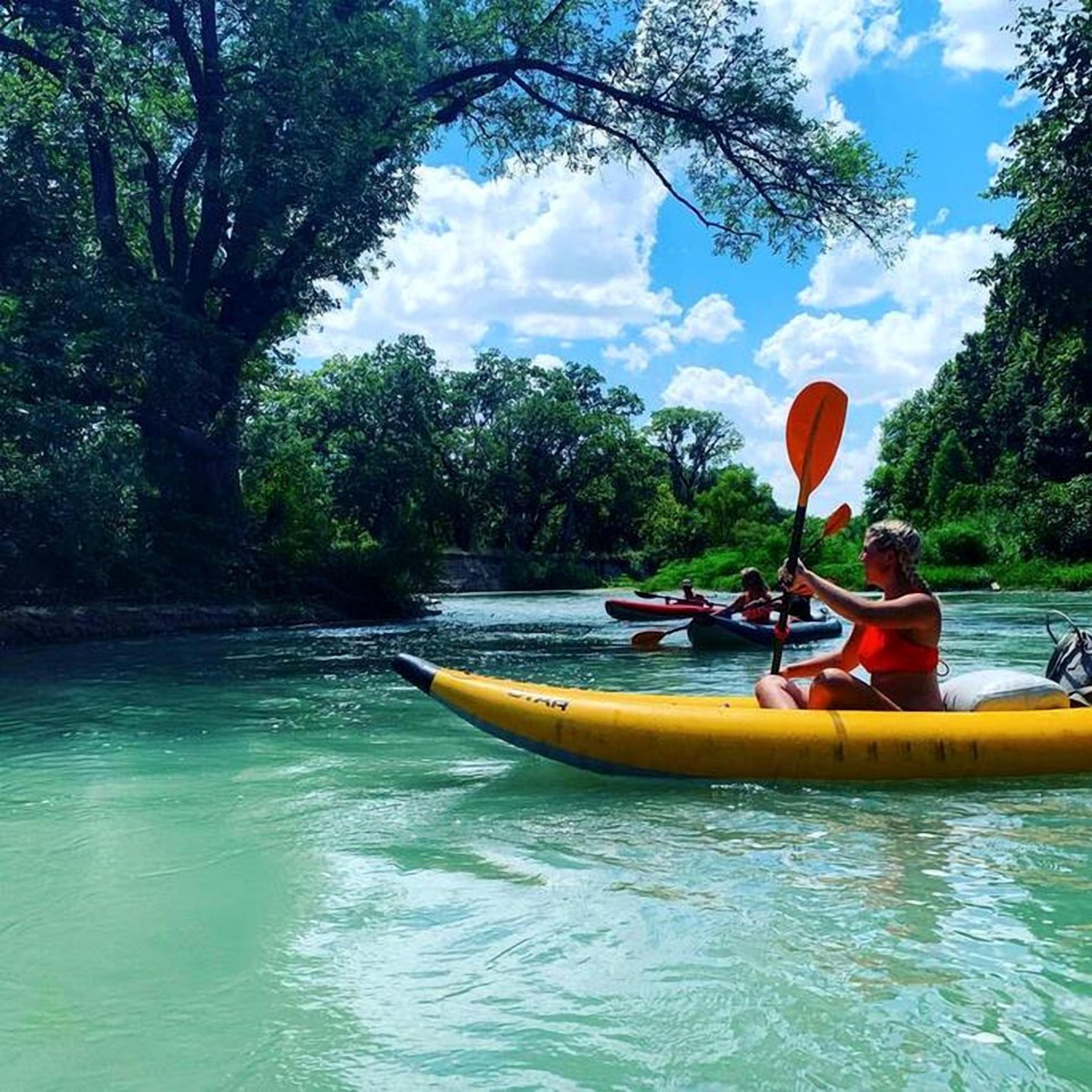 A river scene with kayaks.
