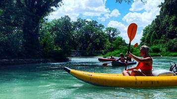 A river scene with kayaks.