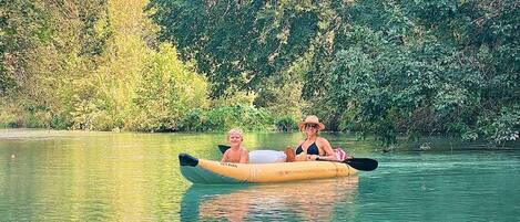 A river scene with a kayak.