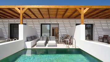 Suite, Pool View | In-room safe, soundproofing, iron/ironing board, free WiFi