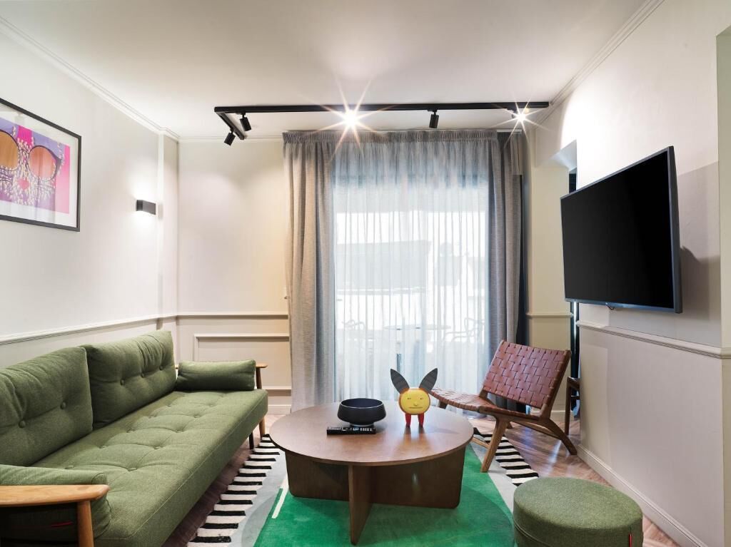 Superior Studio Suite, Balcony | Living area