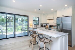 Fridge, microwave, oven, stovetop - Elevated Island Living: A Completely Reimagined Sanibel Sanctuary (Sanibel)