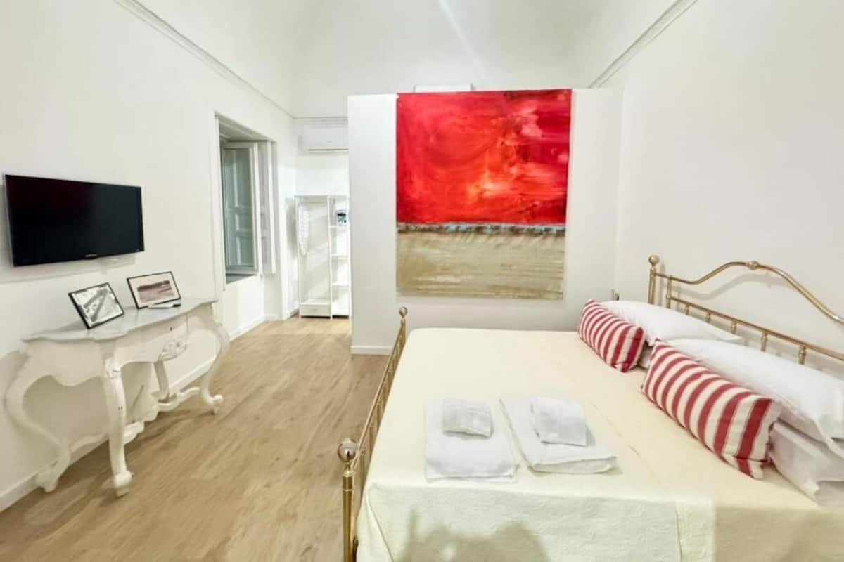 Comfort Triple Room, City View | Blackout drapes, free WiFi