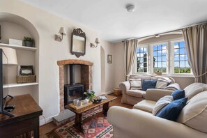 TV, fireplace - Alms House West, Grade II Listed, Garden & Patio (Forthampton)