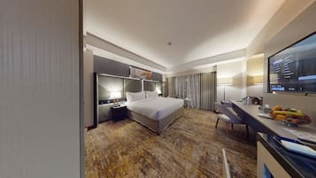 Deluxe-huone, kaupunkinäköala | Tallelokero huoneessa, pimennysverhot, äänieristys, ilmainen Wi-Fi