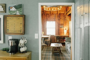 The living room beckons you to come and settle in.