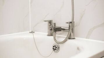 Hair dryer, towels, soap, toilet paper