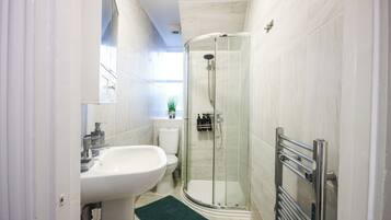 Hair dryer, towels, soap, toilet paper