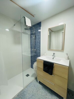 Hair dryer, towels, soap, toilet paper