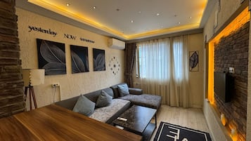 Deluxe Apartment | Living area