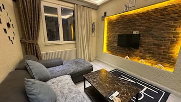 Deluxe Apartment | Living area