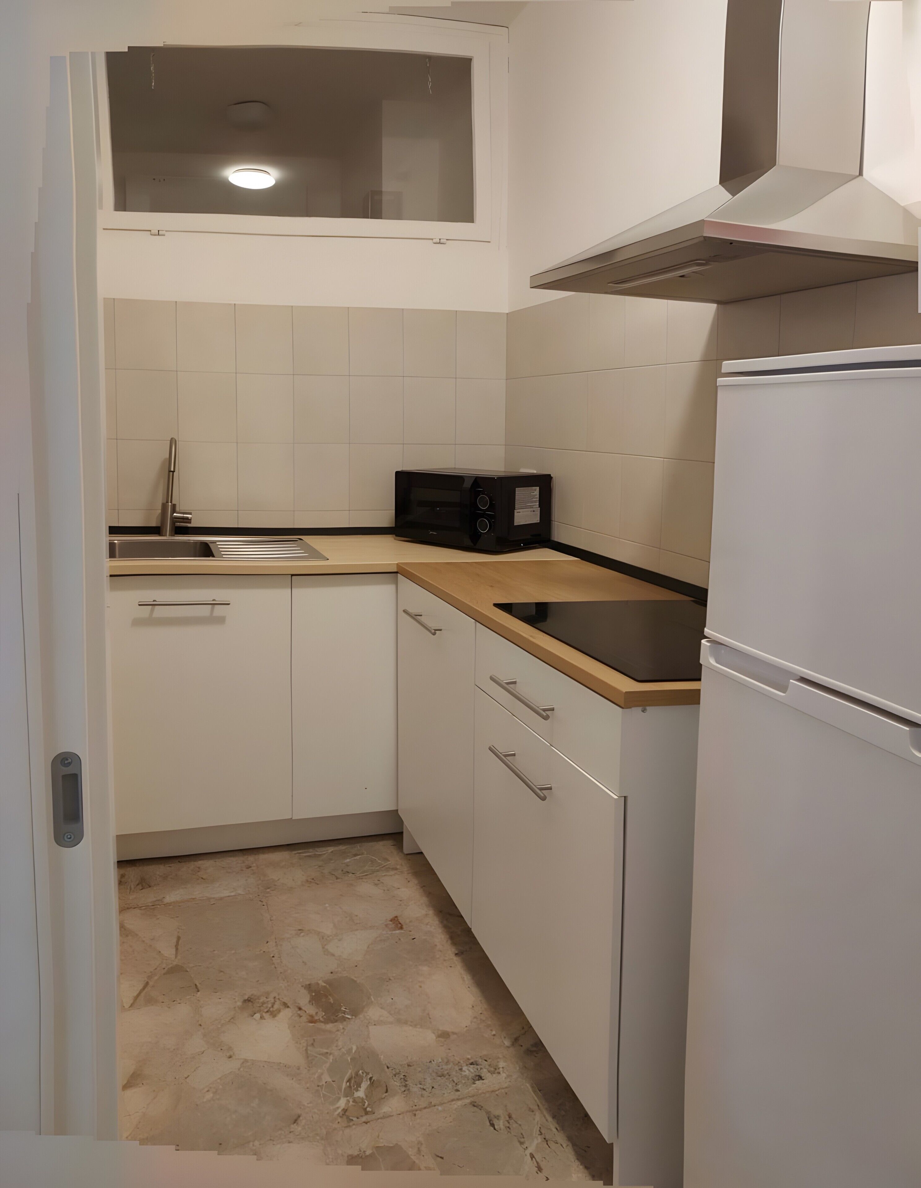 Fridge, stovetop, highchair, cookware/dishes/utensils