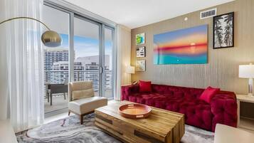 Suite Deluxe, balcon, vue mer | Coin séjour